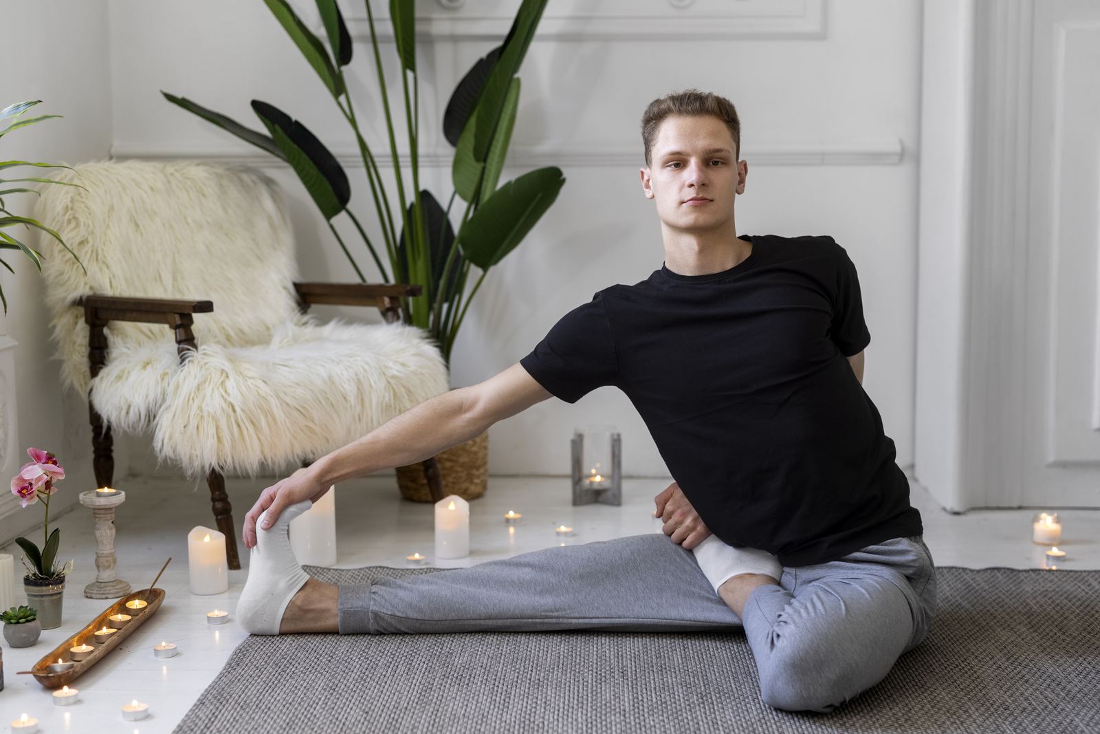 Man practising a weekly yoga routine